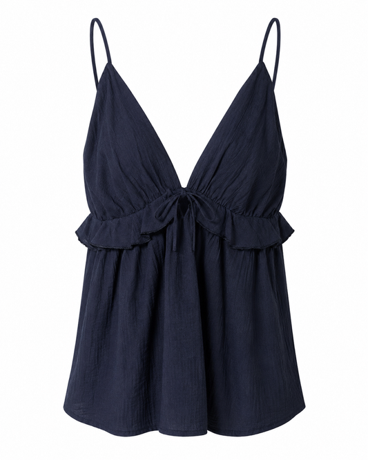 Top babydoll blu navy con spalline sottili, laccetto frontale e balza romantica.